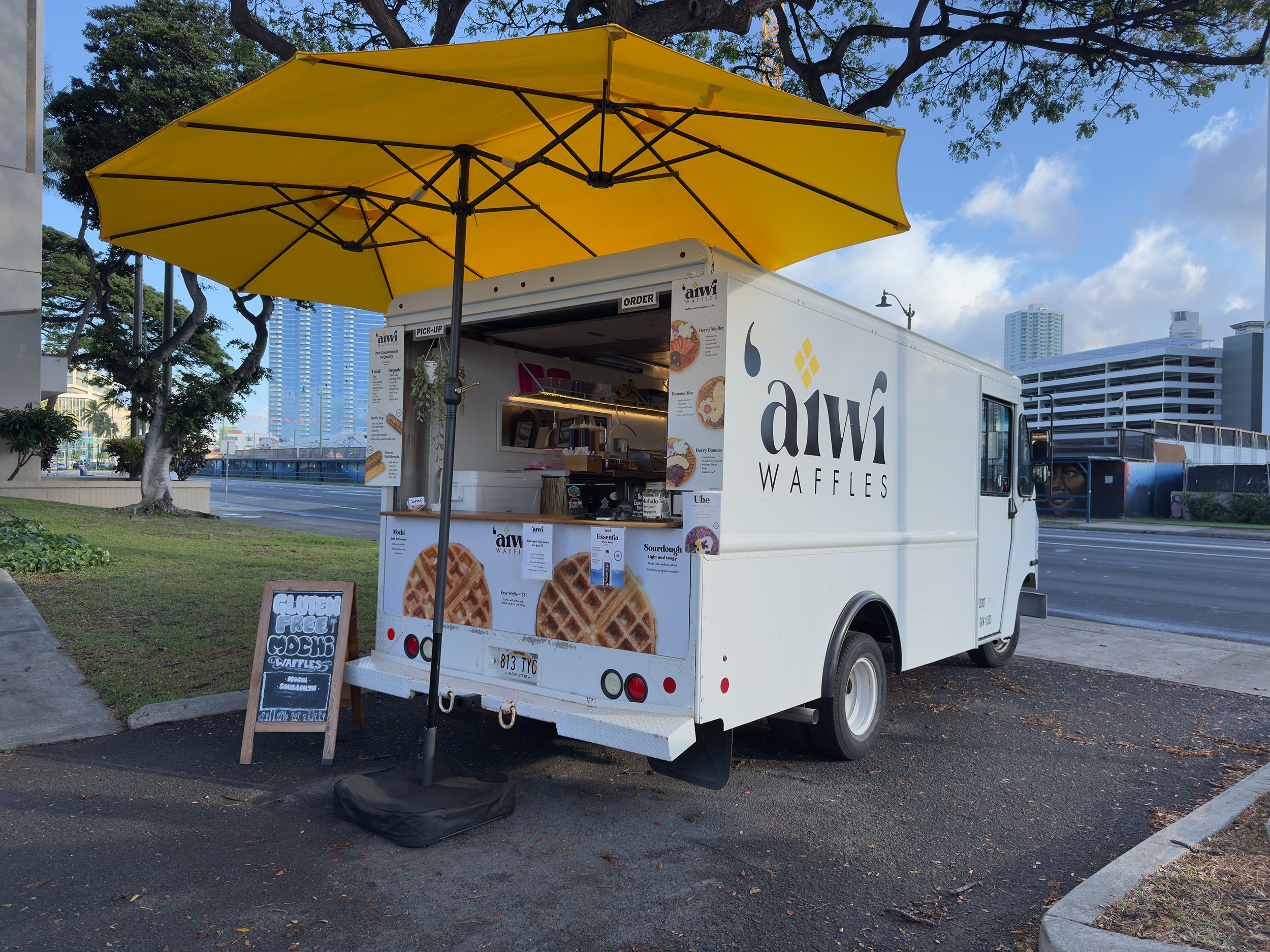 Aiwi Waffles food truck located at the Kakaako farmers market in Honolulu, Hawaii.